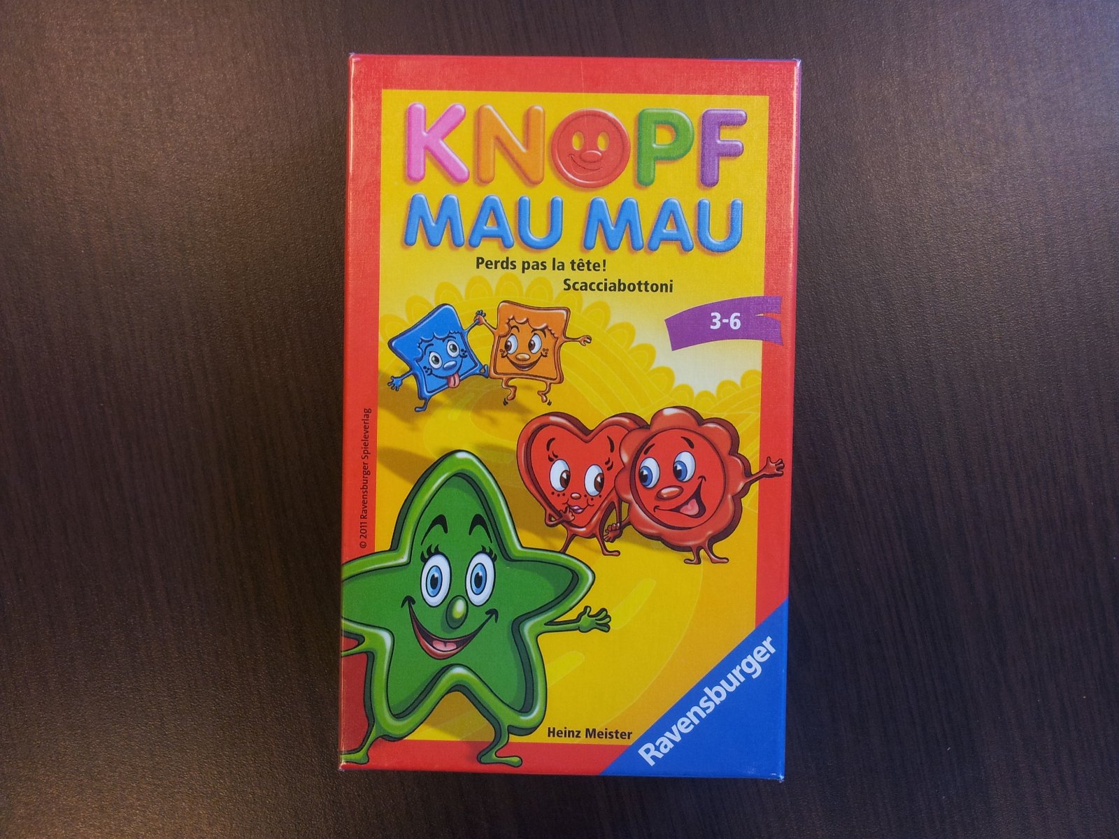 Knopf Mau Mau
