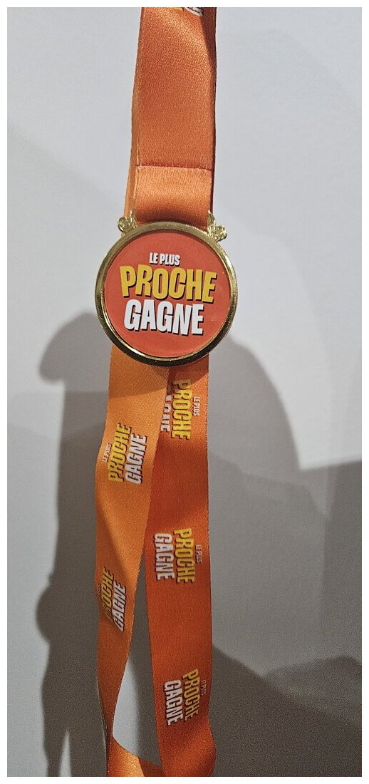 Le Plus Proche Gagne - Médaille